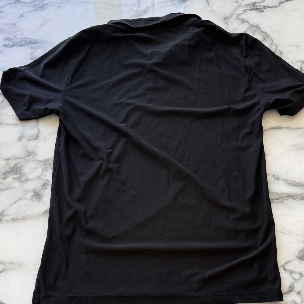 Vuori Black Short-Sleeve Performance Polo - Picture 4 of 5